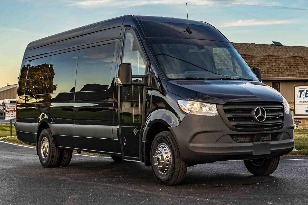 An Executive Sprinter Van arriving at Chicago O'Hare International Airport for a group luggage and passenger drop-off.