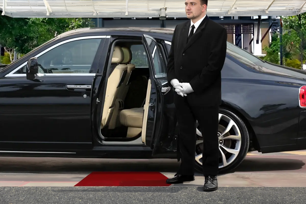 Orland Park to Midway Limo uniformed chauffeur welcoming passenger at Orland Park residence